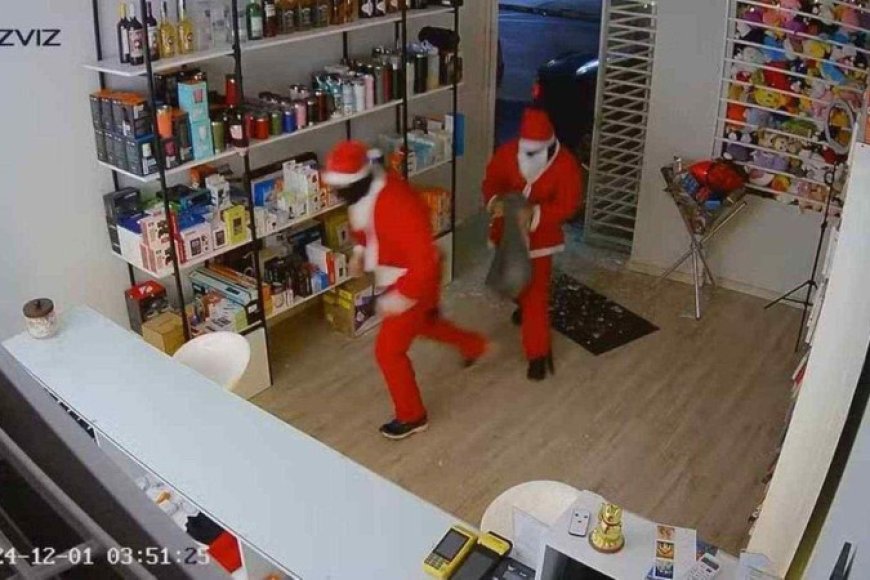 CRIMINOSOS VESTIDOS DE PAPAI NOEL FURTAM LOJA DE ELETRÔNICOS